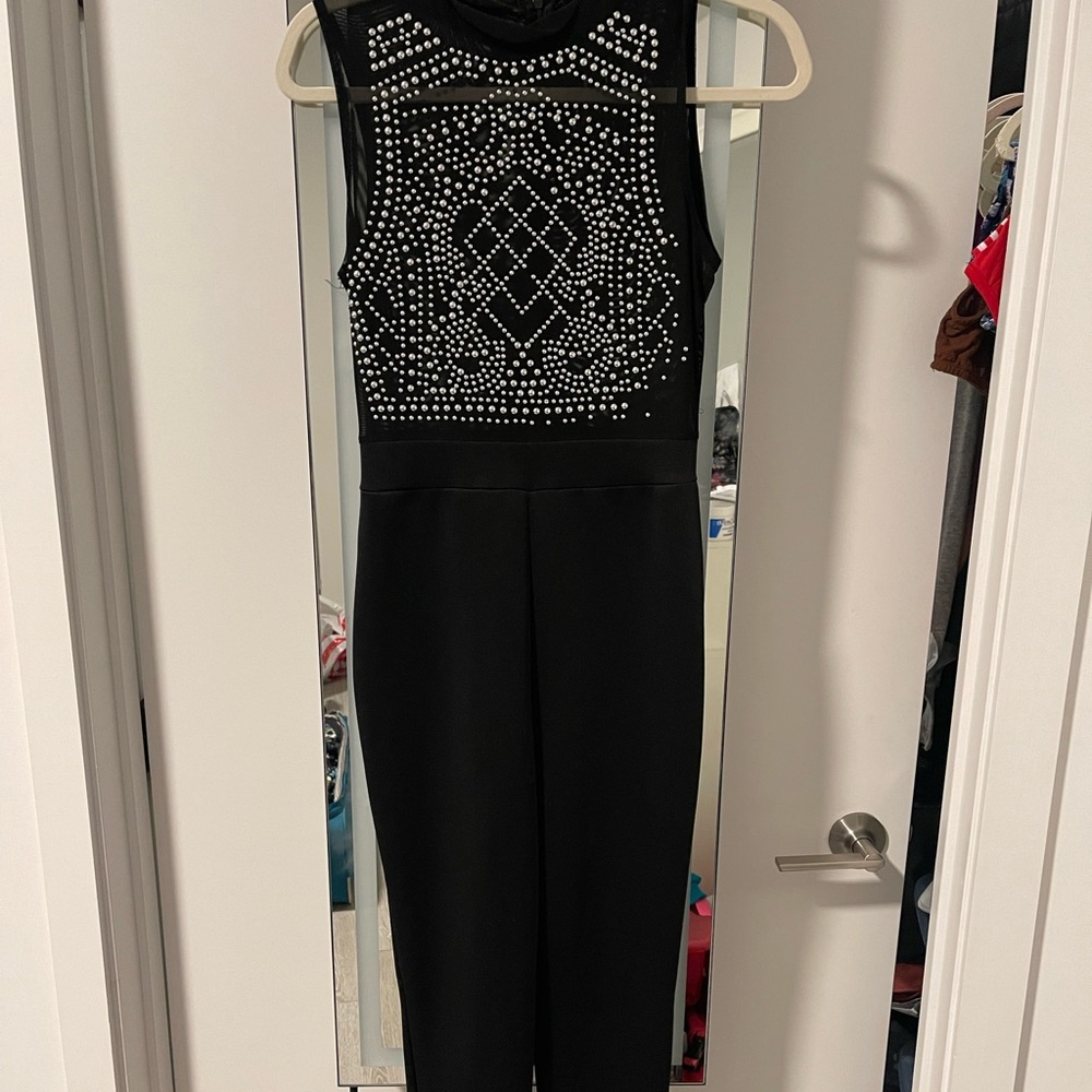 Black, sheer top jumpsuit. Perfect for new year’s!!